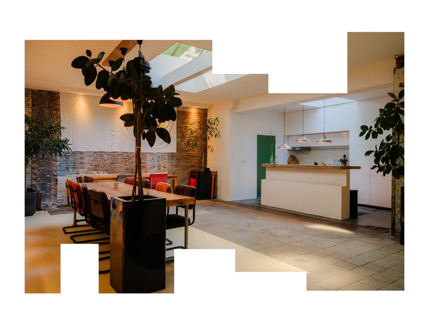 The dining room at KLUP, with the long wooden table